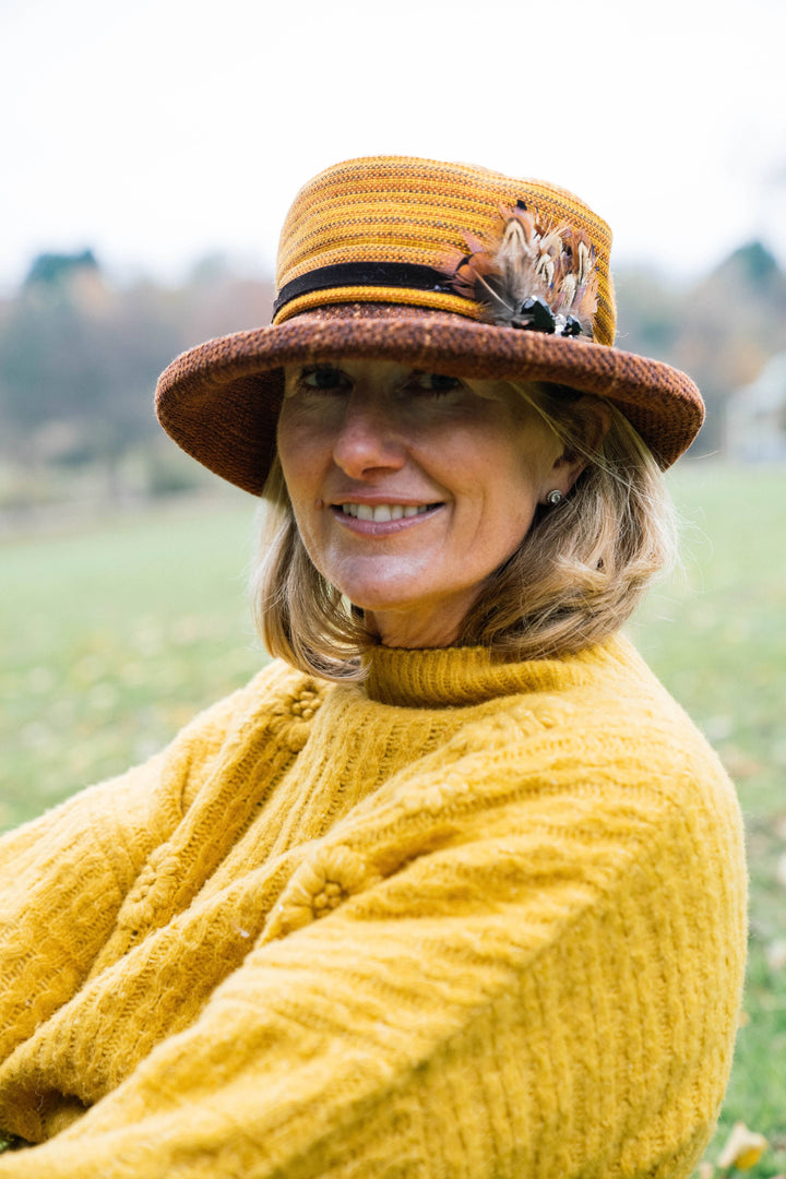 Limited Edition Autumn Woven Chenille Rich Autumn Coloured Hat with Feather Decoration.