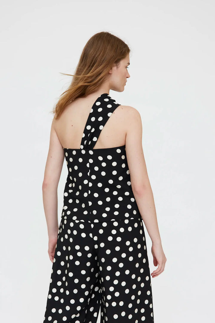 Asymmetrical top with black and white polka dot print