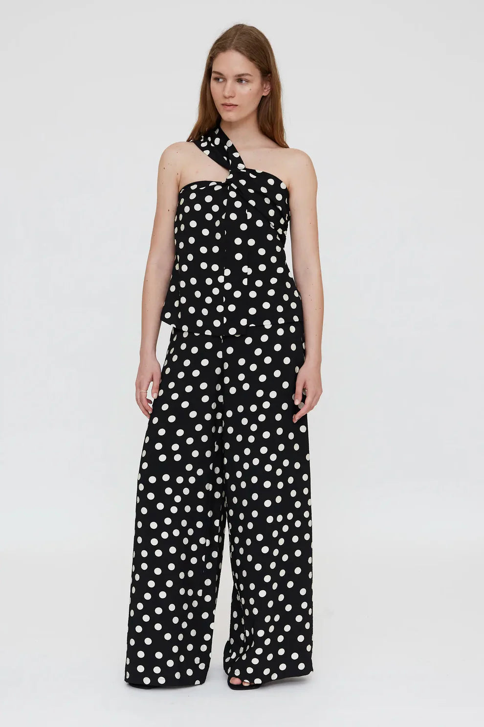 Asymmetrical top with black and white polka dot print